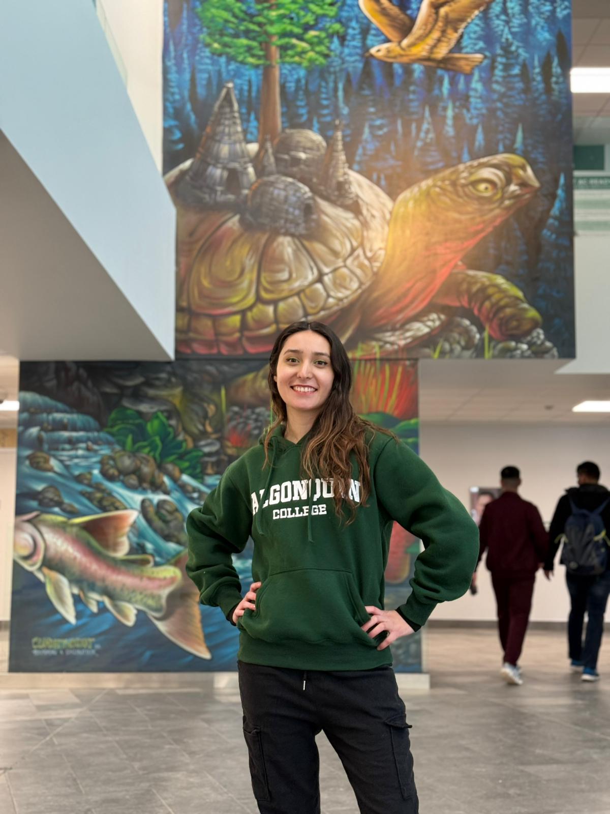 Lorena Arroyo Perez at the Algonquin College mural